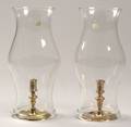 Two Brass Candlesticks with Hurricane Shades