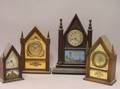 Four Reproduction Miniature Steeple Shelf Timepieces