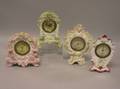 Four China Mantel Timepieces