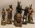 Seven Patinated Bronze Asian and Whimsical Figures