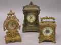 Three Renaissance Revival Style Gilt Cast Metal Shelf Timepieces