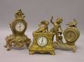 Three Rococostyle Gilt Cast Metal Timepieces