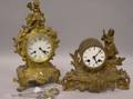 Two French and Swiss Rococostyle Gilt Cast Metal Mantel Clocks