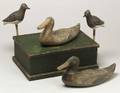 Two Painted Canvas Duck Decoys a Pair of Painted Tin Bird Decoys and a Green Painted Wooden Box