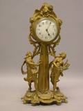 French Rococostyle Gilt Cast Metal Figural Mantel Clock