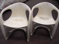 Two Modern Design Molded White Plastic Armchairs