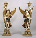 Pair of Continental Gilt and Polychrome Carved Wood Archangel Floor Candlesticks
