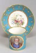 Sevres Porcelain Painted and Faux Jeweled Cup and Saucer