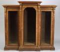 Pair of American Renaissance Revival Part Ebonized Walnut Glazed Book Cabinets