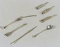 Nine Small Silver Spoons and Tools