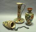 Aller Vale Persian Hanging Amphora Vase Tall Scrolls Chamberstick and an Exeter Persian Vase