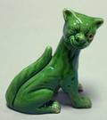 Watcombe Green Glazed Grotesque Winking Cat Figural with Yellow Glass Eye