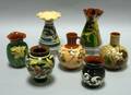 Seven Small Torquay Pottery Vases