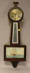 New Haven Clock Co Whitney Federalstyle Mahogany and ReversePainted Glass Banjo Timepiece
