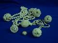 Five Frank DelCampo Carved Ivory Ball Necklaces a Ring and a Sea Life Series Ball