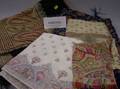 Eight Woven and Printed Paisley Textile Items and Fragments