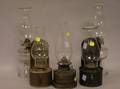 Three Tin Oil Lamps and Two Colorless Glass Chamber Oil Lamps