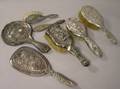 Seven Sterling Silver and Silver Plated Dresser Brushes and Hand Mirrors