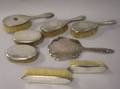 Eight Hammered Sterling Silver and Silver Plated Dresser Brushes and Hand Mirrors