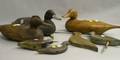 Three Carved and Painted Wooden Duck Decoys and Four Shore Birds
