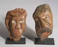 Two Polychromed Painted David Marshall Stone Carved Heads