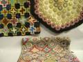 Appliqued and Embroidered Penny Rug and Two Patterned Hooked Rugs