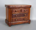 Mahogany empire miniature chest of drawers