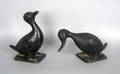 Two cast iron duck yard ornaments