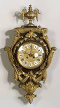 Small Louis XVIstyle Gilt Metal Mounted and Ebonized Wood Cartel Clock