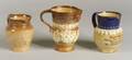 Three Doulton Stoneware Pitchers