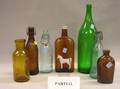 Collection of Approximately Fiftythree Colored Glass Beer Liquor and Spring Water Bottles