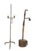 Two wrought iron floor standing lighting devices late 18th c