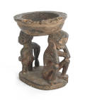 Carved African bowl supported by two human figures