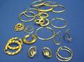 Group of Gold Bangle Bracelets and Hoop Earrings