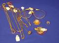 Gold Chains and Charms Bib Holder and Eyeglasses