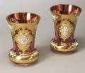 Pair of Bohemian Parcel Gilt Cranberry Flashed and Encrusted Glass Spill Vases
