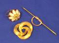 18kt Brushed Gold Knot Pin Gold Coral and Gemstone Ring and a 14kt Knot Kilt Pin