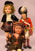 Three Cloth and Composition Dolls
