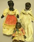 Two Black Dolls and Black Puppet