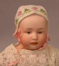 Heubach Bisque Shoulder Head Girl with Molded Bonnet