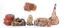 Group of carved stone Asian objects including disks