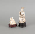 Two Asian carved ivory figures