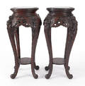 Pair of heavily carved Chinese teak ferniers