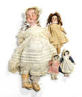 Four bisque dolls to include Armand Marselle