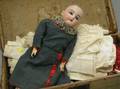 Kestner Bisque Head Doll and Clothing in a Hidecovered Trunk