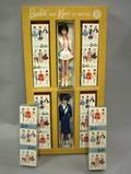 Easelback Display from 1962 with Six Barbie Dolls