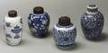 Four Blue and White Covered Jars