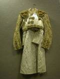 Gold Thread and Sequin Applied White Satin Matador Jacket and a Ladys Brocade Coat