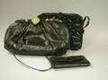 Three Judith Lieber Black Reptile Pattern Handbags and Purses
