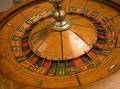 Satinwood Veneer and Painted Walnut Roulette Wheel and Stand